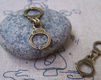 Accessories - 10 Pcs Of Antique Bronze Handcuff Charms 11x30mm A1602