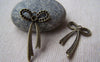 Accessories - 10 Pcs Of Antique Bronze Long Knot Bow Tie Charms 19x34mm A744
