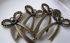 Accessories - 10 Pcs Of Antique Bronze Long Knot Bow Tie Charms 19x34mm A744
