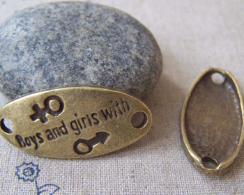 Accessories - 10 Pcs Of Antique Bronze Oval Boy And Girl Gender Connectors 16x33mm A3959