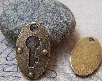 Accessories - 10 Pcs Of Antique Bronze Oval Skeleton Key Cut Out Pendants 17x27mm A5803