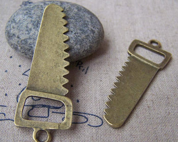 Accessories - 10 Pcs Of Antique Bronze Saw Charms Pendants 19x50mm A4025