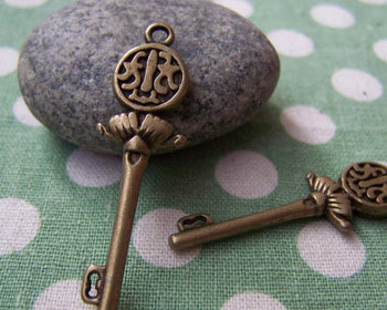 Accessories - 10 Pcs Of Antique Bronze Skeleton Key Charms Pendants Double Sided  11x40mm A2785