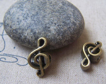 Accessories - 10 Pcs Of Antique Bronze Treble Clef  Music Note Beads 9x18mm A4892