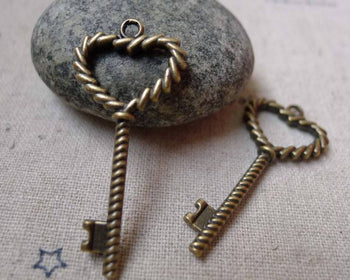 Accessories - 10 Pcs Of Antique Bronze Twisted Heart Screw Key Charms 17x36mm A6087