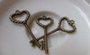 Accessories - 10 Pcs Of Antique Bronze Twisted Heart Screw Key Charms 17x36mm A6087