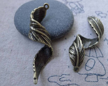 Accessories - 10 Pcs Of Antique Bronze Twisted Tree Leaf Charms Pendants  14x44mm A7666