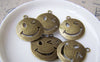 Accessories - 10 Pcs Of Antique Bronze Wink Icon Charms 23mm A731