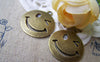 Accessories - 10 Pcs Of Antique Bronze Wink Icon Charms 23mm A731