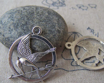 Accessories - 10 Pcs Of Antique Silver Bird Carrying Arrow Round Charms 25mm A4327