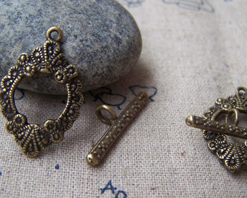 Accessories - 10 Sets Of Antique Bronze Oval Textured Flower Toggle Clasps 17x24mm A228