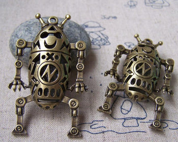 Accessories - 2 Pcs Of Antique Bronze Filigree Robot Pendant Double Sided 32x58mm A730