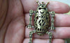 Accessories - 2 Pcs Of Antique Bronze Filigree Robot Pendant Double Sided 32x58mm A730
