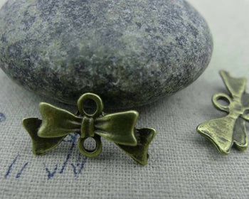 Accessories - 20 Pcs Of Antique Bronze Bow Tie Knot Connector 8x20mm A743