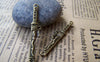 Accessories - 20 Pcs Of Antique Bronze Chinese Dragon Sword Charms Pendants Double Sided 7x43mm A1123