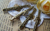 Accessories - 20 Pcs Of Antique Bronze Chinese Dragon Sword Charms Pendants Double Sided 7x43mm A1123