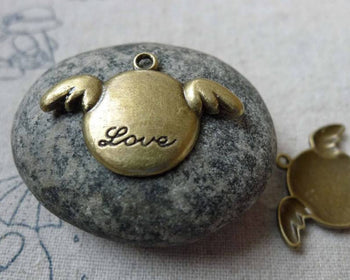 Accessories - 20 Pcs Of Antique Bronze Fat Angel Heart Wing Charms 14x24mm A6504