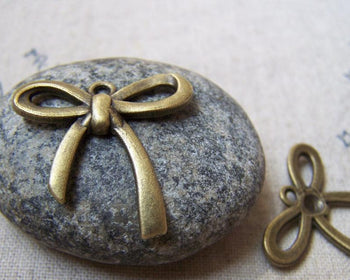Accessories - 20 Pcs Of Antique Bronze Knot Bow Tie Charms 25mm A5682
