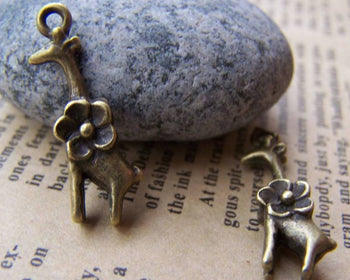 Accessories - 20 Pcs Of Antique Bronze Lovely Flower Giraffe Charms 7x20mm A678