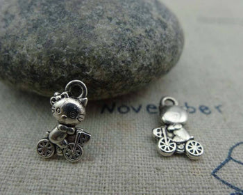 Accessories - 20 Pcs Of Antique Silver Cat Riding Bicycle Charms 7x12mm  A1137