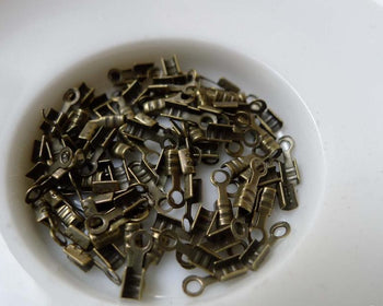 Accessories - 200 Pcs Of Antique Bronze Tiny Fold Over Crimp Head Clasps 7mm A6604