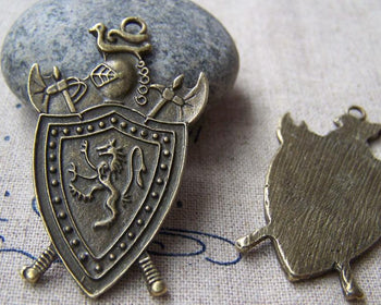 Accessories - 4 Pcs Of Antique Bronze Shield Badge Charms Pendants 28x43mm A263