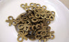 Accessories - 50 Pcs Of Antique Bronze Tiny Flat Butterfly Knot Bow Charms 10x14mm A5178