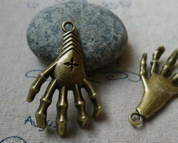 10 pcs of Antique Bronze Skull Skeleton Hand Pendants 25x40mm A5591
