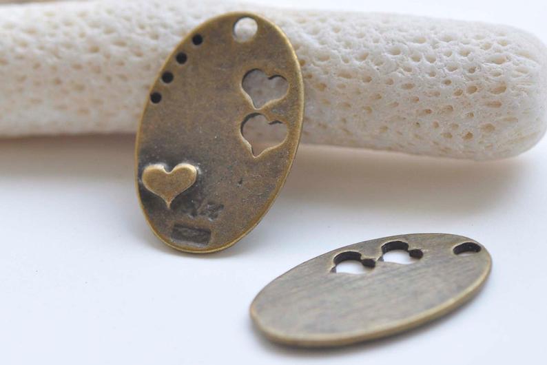 10 pcs Antique Bronze Oval Heart Charms 17x26mm A5447
