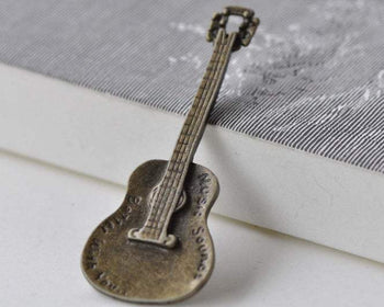 Accessories - 10 Pcs Of Antique Bronze Guitar Pendants Charms 23x62mm A1692