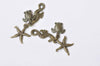 Antique Bronze Ocean Creature Kit Charms Pendants Set of 10 A8983