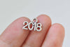 30 pcs Antique Silver New Year 2018 Charms 10x13mm A549