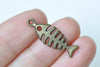 10 pcs Antique Bronze Filigree Fish Bone Pendants Charms 9x25mm A6055