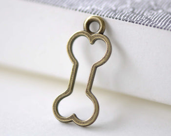 Antique Bronze Outlined Dog Bone Pet Ornament Charms Set of 20 A8013